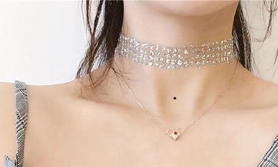 脖子正中有痣代表什么