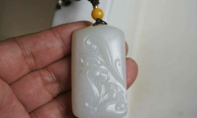 属龙的人戴什么玉吊坠好(属龙的男孩子戴什么玉好)