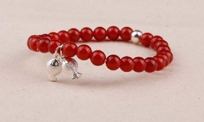 属鼠女生本命年送什么