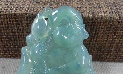 古玉招财童子（自己梦见被蛇咬了）