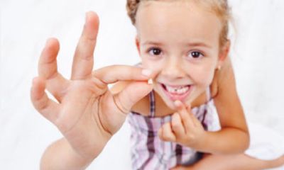 女人梦见自己掉了一颗下牙齿（女人梦见左下大牙掉了一颗）